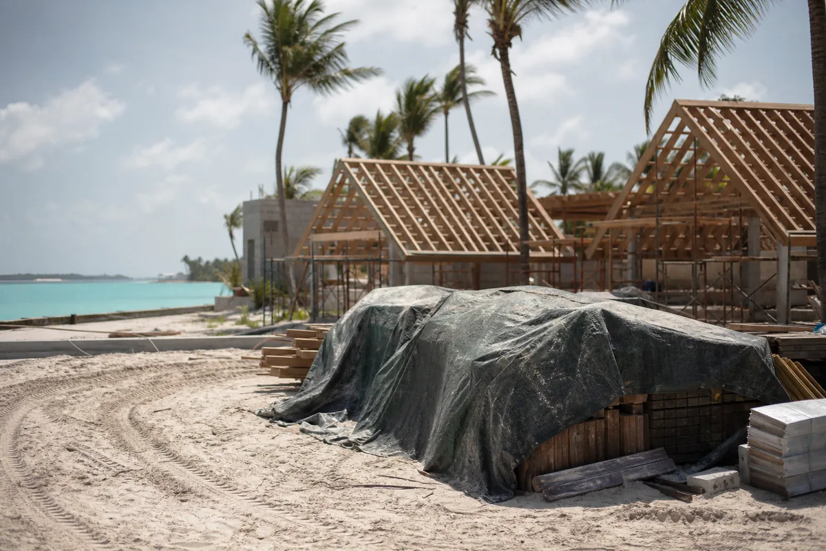 Island resort construction beside a lagoon